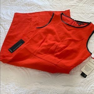 Reddish orange knee length dress